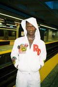 "Success Over War™" Windbreaker Top